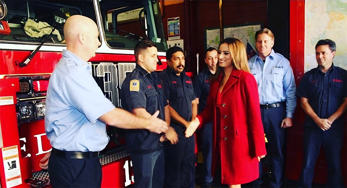 Jenifer Rajkumar meeting fire fighters.